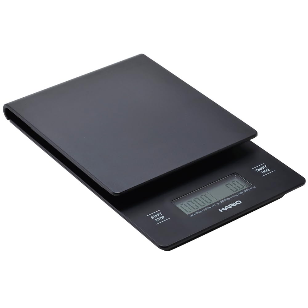 Black digital kitchen scale on a white background