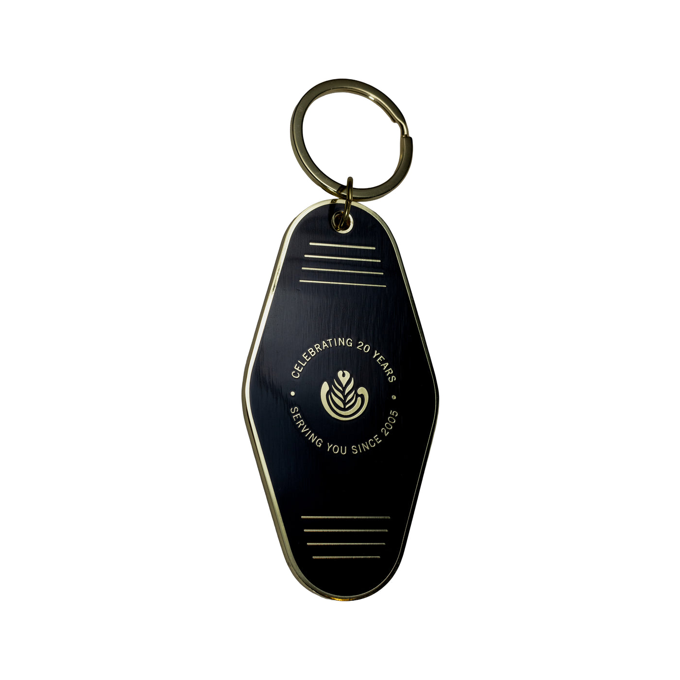 Black keychain with gold accents on a white background