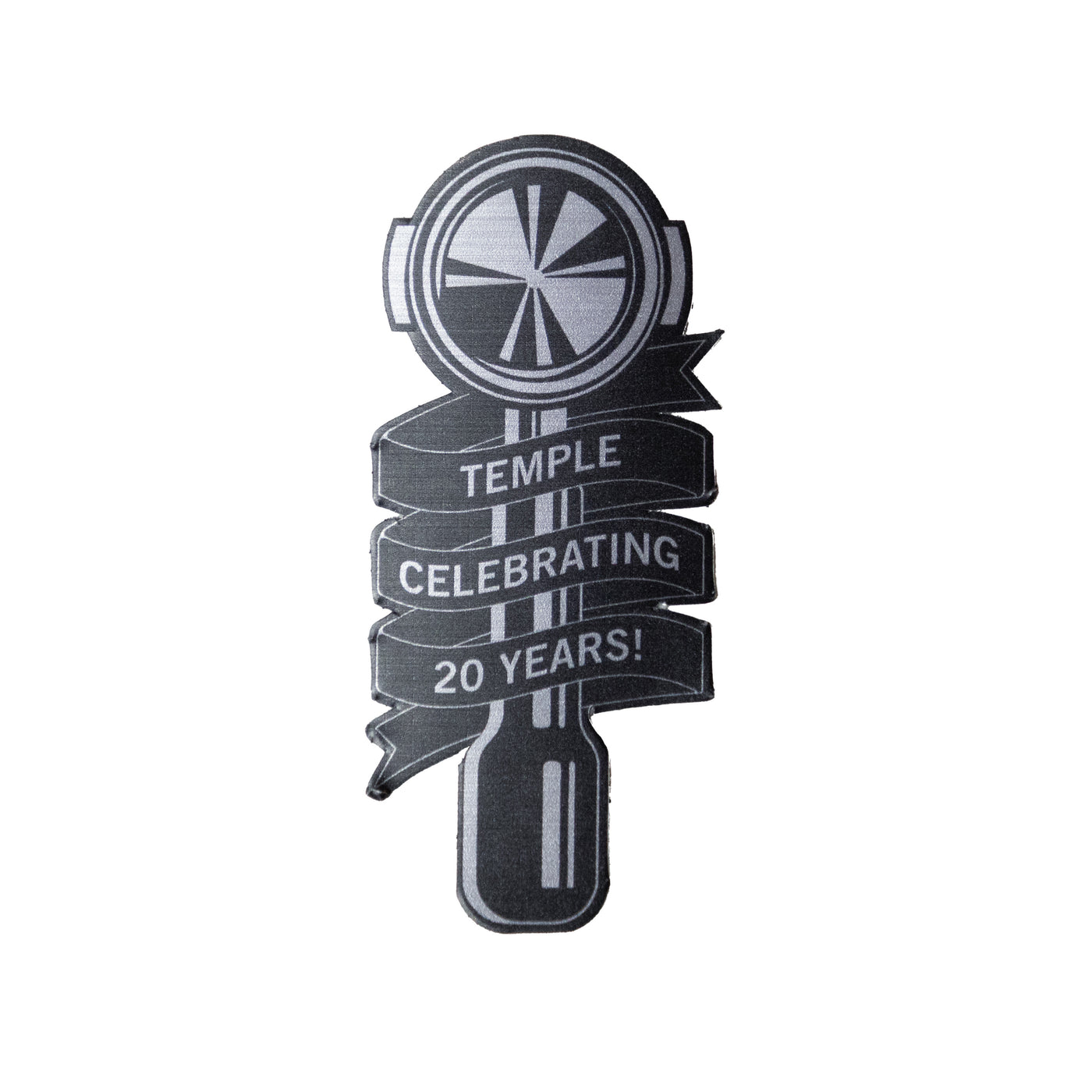 Die-cut sticker of a portafilter wrapped in a ribbon reading ‘Temple Celebrating 20 Years!’ with a brushed metal finish.