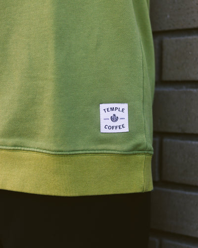 Green Crewneck Sweater with "COFFEE" sewn on and a Temple Coffee patch.