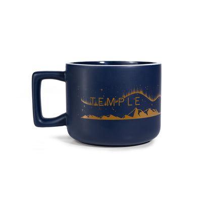 Navy blue mug with gold mountain design and 'TEMPLE' text on a white background