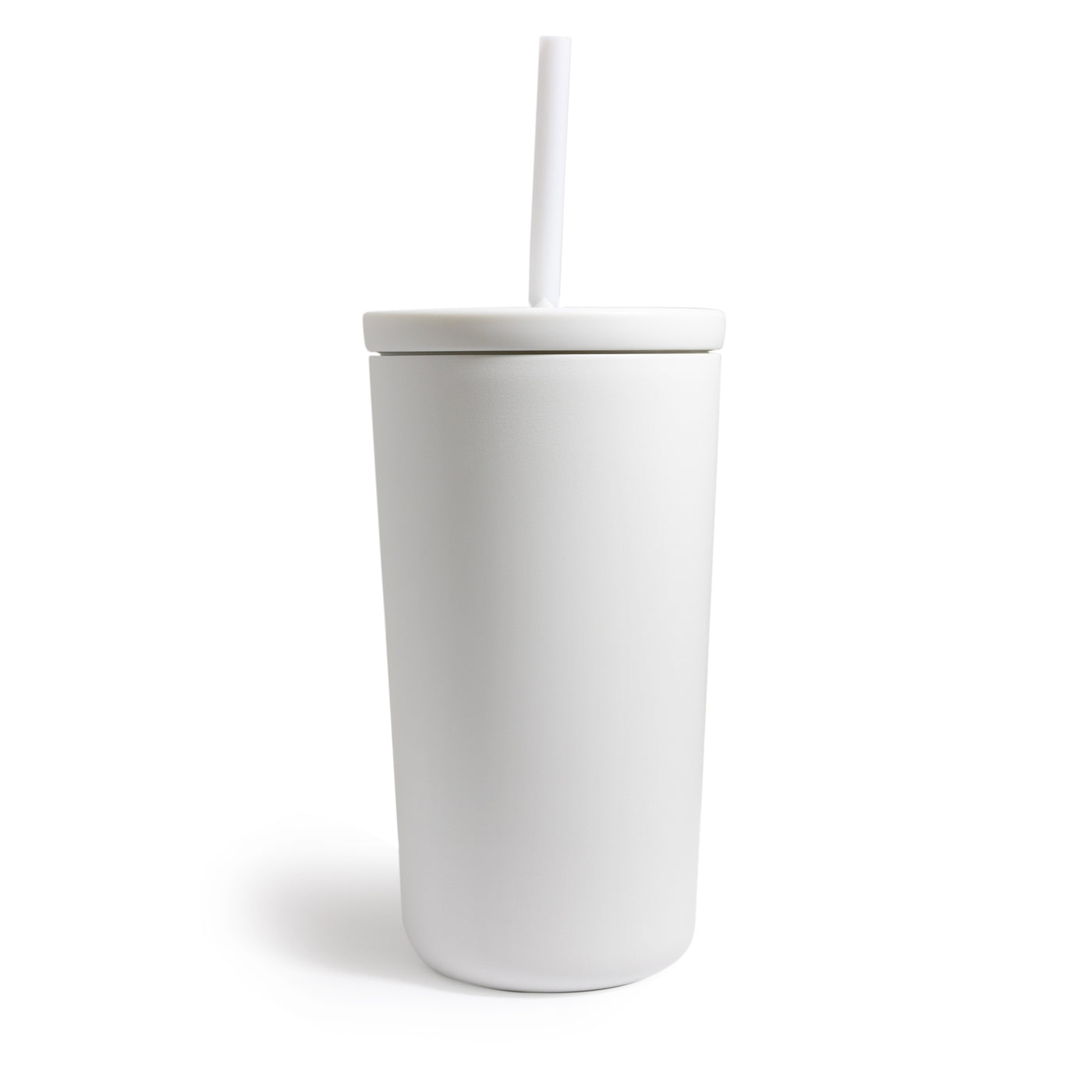 White tumbler with straw.