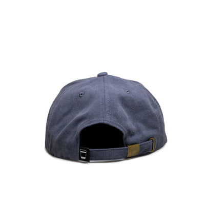 A blue baseball cap shown from the back, with an adjustable strap and a small cup icon tag on the right side.